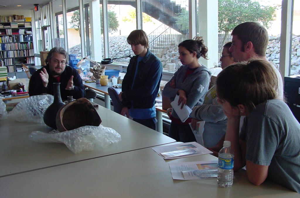 xDSC00004 Dr. Brandon provides a guest lecture to the ART 2063 Ceramics II class on how Native Americans made pottery and how archeologists use it to understand the past (2006).
