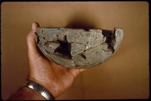 SAU519 The reassembled King's Creek bowl..photographed (with Dr. Frank Schambach's hand).