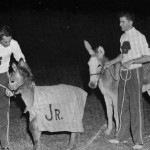 Cheerleaders show Optimaggie and son, Adolphus photo